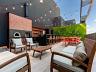 Rooftop Gourmet com churrasqueira e forno de pizza